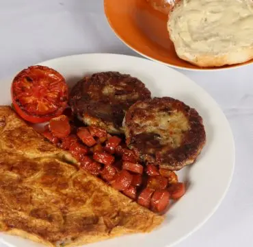 Only AED 20
Parsi Omelet – Weekend Breakfast
Order of 2 eggs parsi omelets loaded with onions, tomatoes, light spices, fried in a pan till lightly golden brown on both side served with sausage, hash brown, brun maska